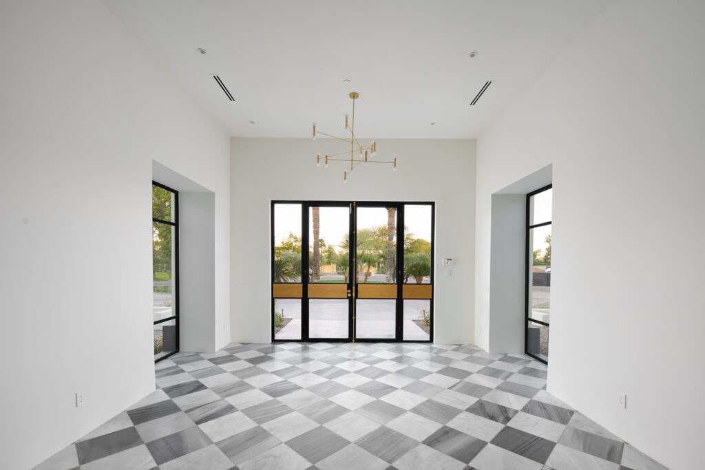 Modern foyer with checkered floor