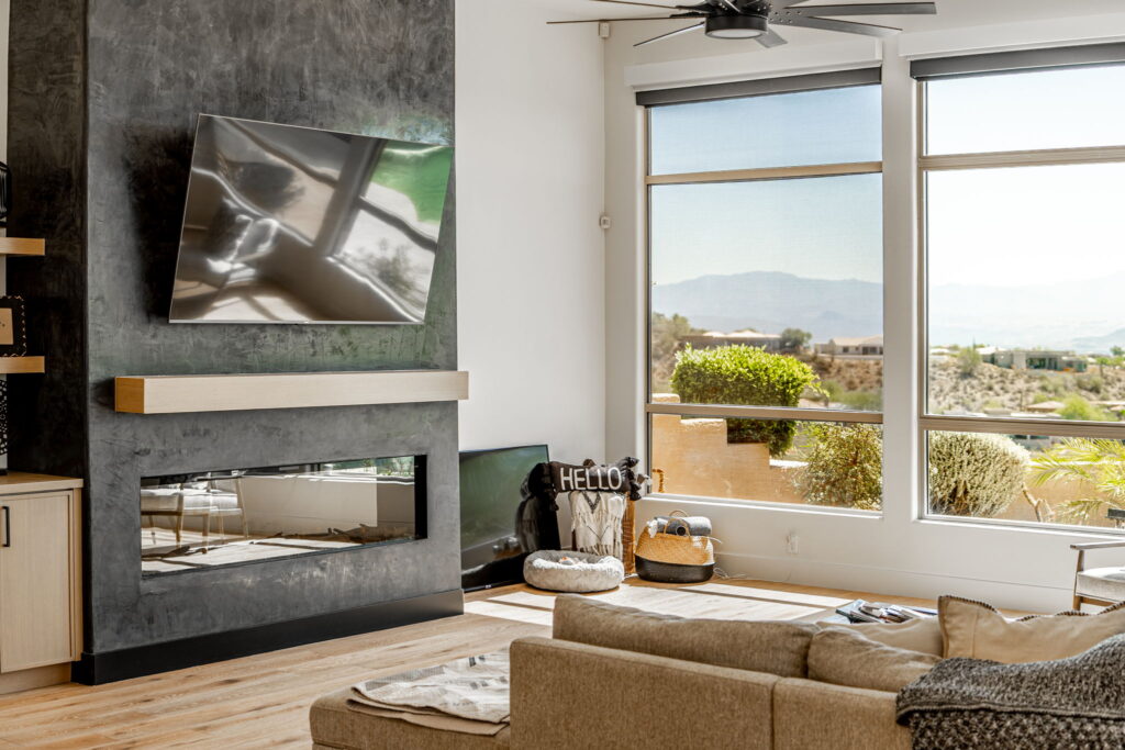 Modern living room with fireplace and view